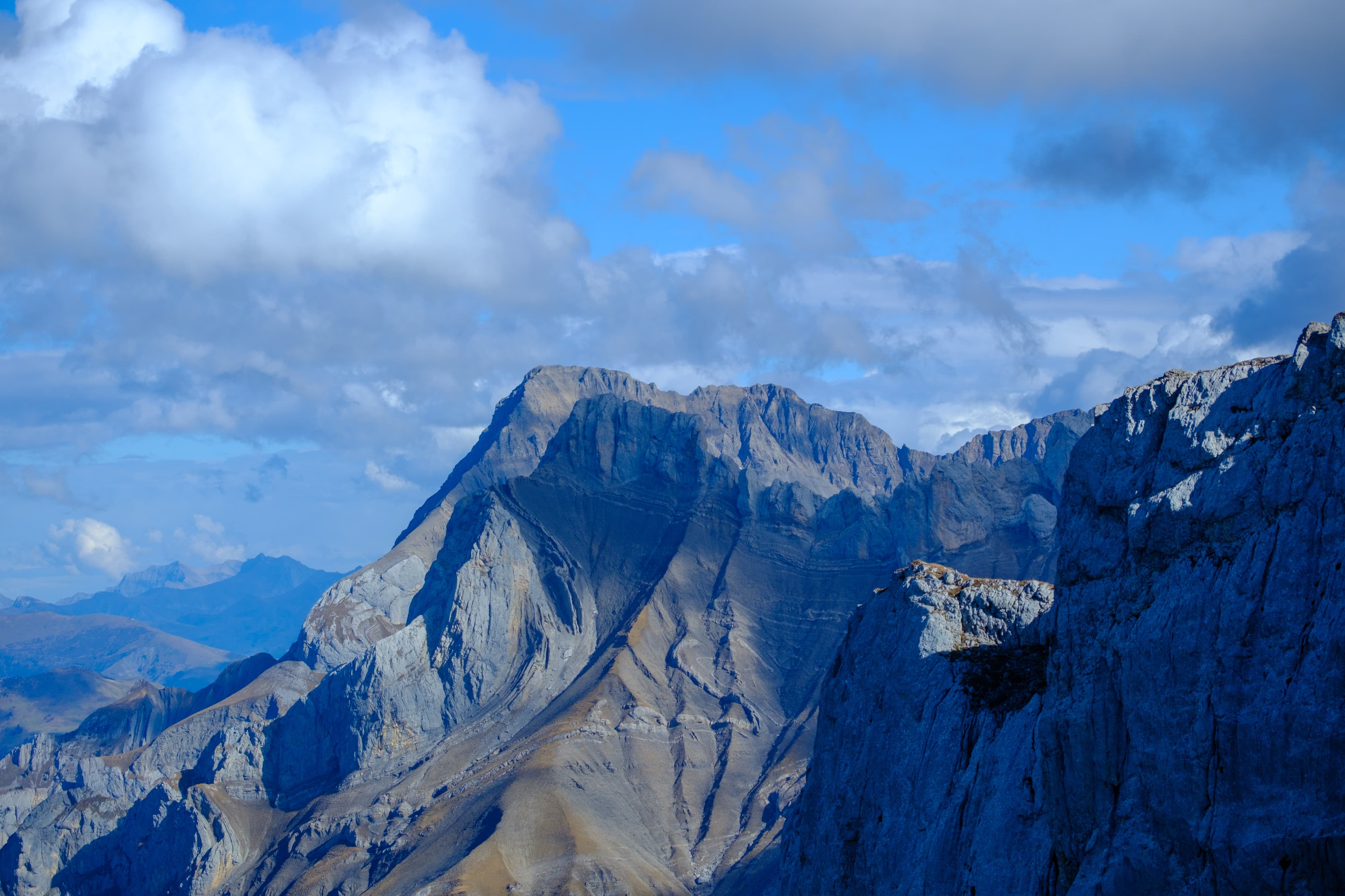 70mm · f/4 · 1/1600s · ISO 125
FUJIFILM X-T5 · XF70-300mmF4-5.6 R LM OIS WR · Oct 24, 2024
Jagged mountain peaks under a blue sky with white clouds.
Saanen, Switzerland
© Brandon Cook